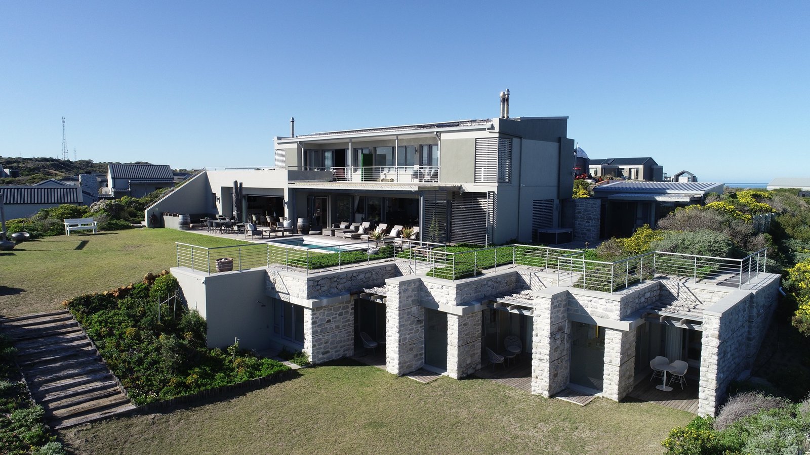 Luxury Beachfront Villa for Sale in Gansbaai – Romansbaai Estate - 6-Bed Oceanfront Guesthouse with 180° Sea Views