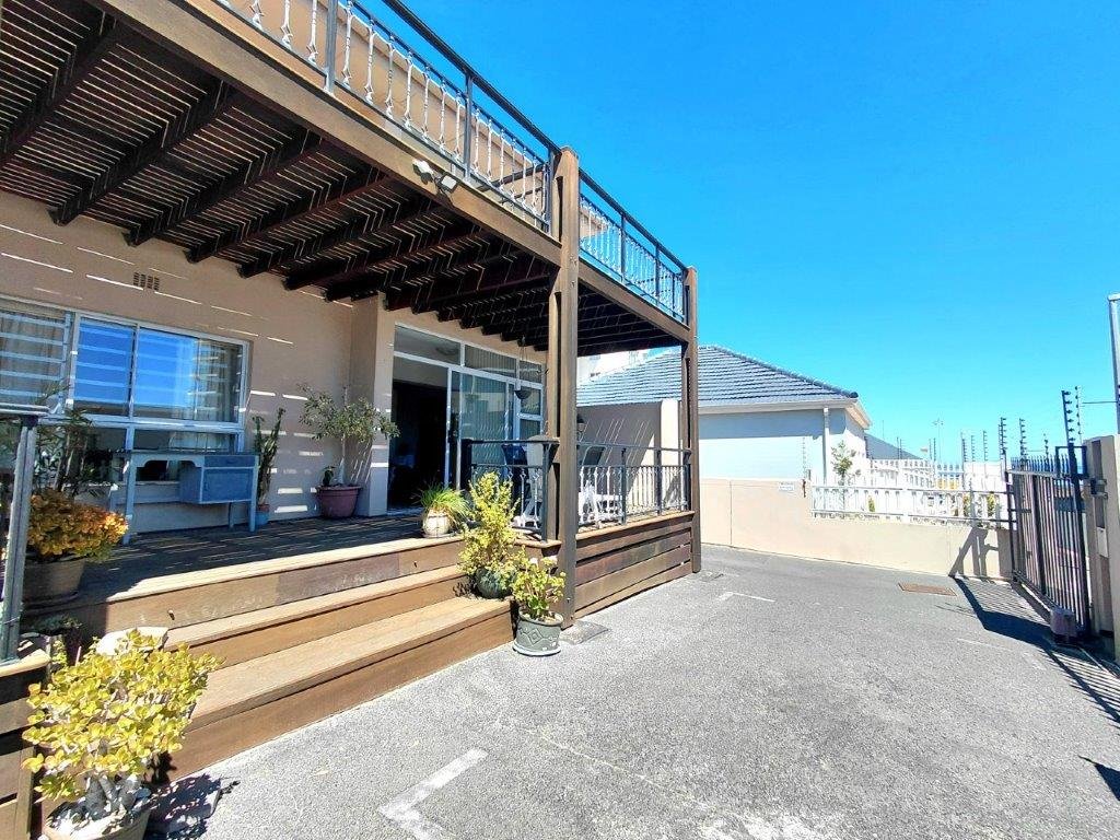 1 Bedroom Ground Floor Apartment for Sale in Strand – Walk to Beach, Lock-Up Garage & Airbnb Potential