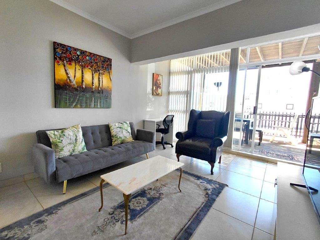 1 Bedroom Ground Floor Apartment for Sale in Strand – Walk to Beach, Lock-Up Garage & Airbnb Potential
