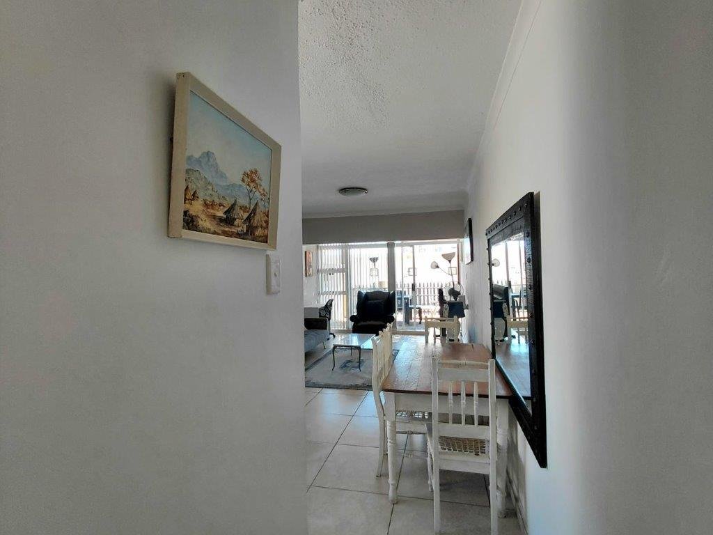 1 Bedroom Ground Floor Apartment for Sale in Strand – Walk to Beach, Lock-Up Garage & Airbnb Potential